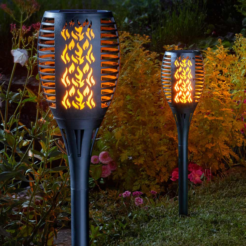 Compact Flaming Torch in garden turned on