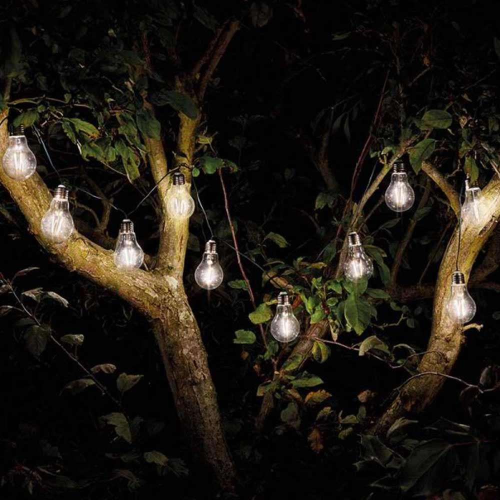 Solar Festoon Filament Led Bulb Lights hanging in tree