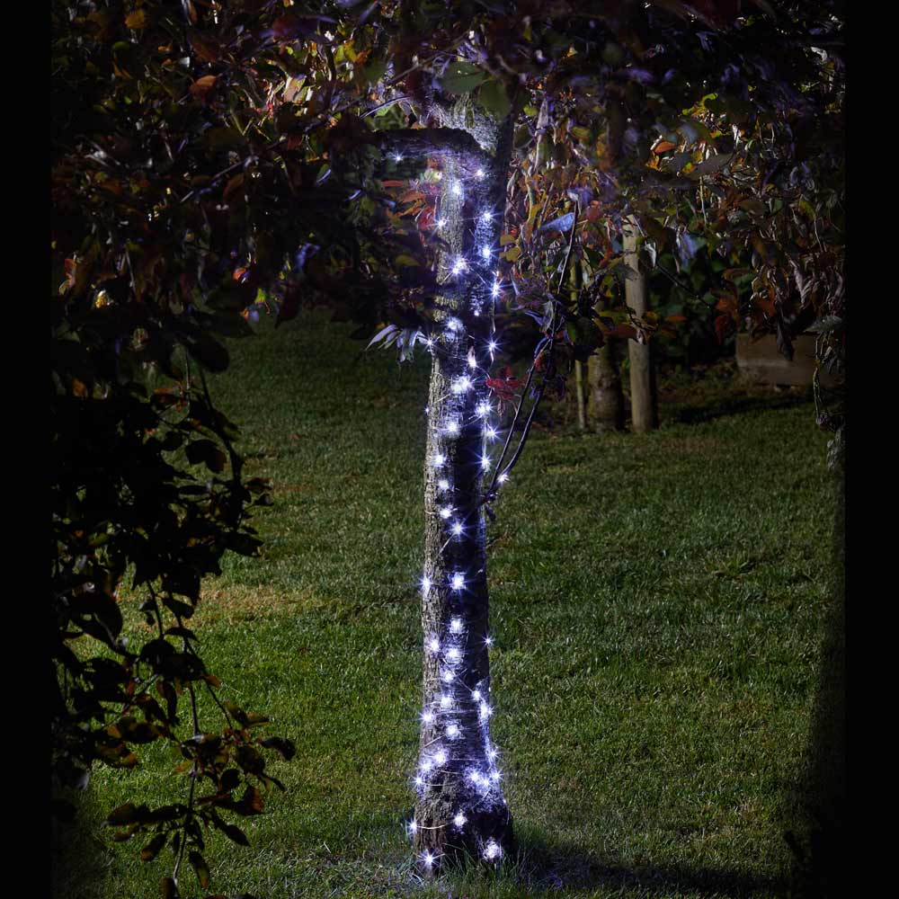 Solar Firefly Lights 100 White in garden on tree